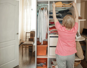 Personal care at home offers routine support to seniors aging in place including organizing and cleaning their closets.